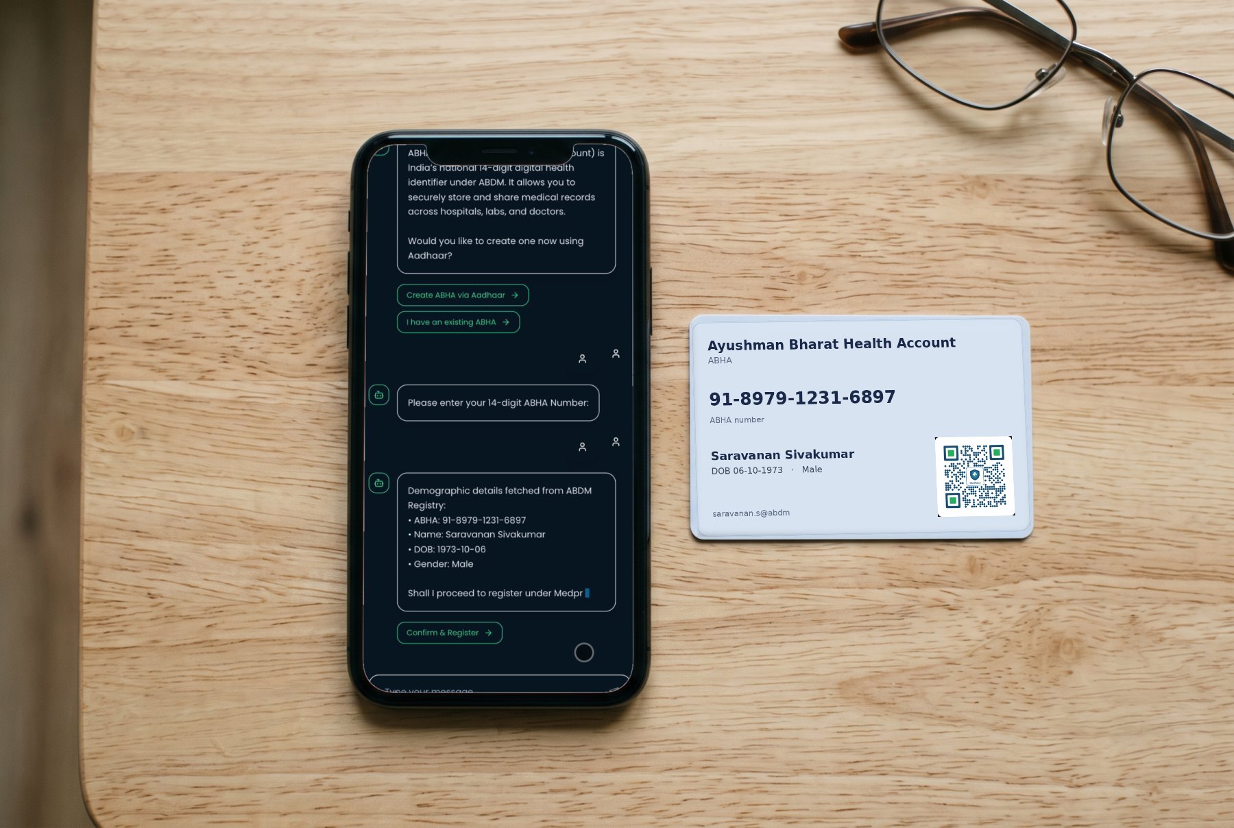 An ABHA card beside a phone showing the ABHA-linking screen
